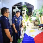 visit wake of slain cop